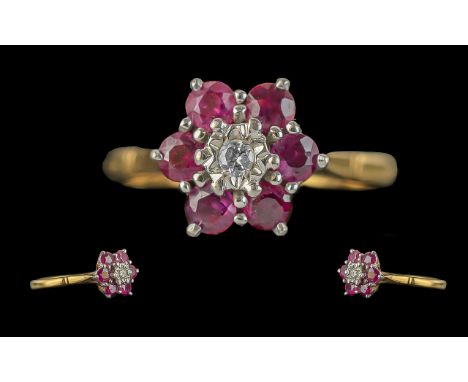 Ladies Pleasing 18ct Gold Ruby and Diamond Set Cluster Ring, flower head design; full hallmark to interior of shank, ring siz