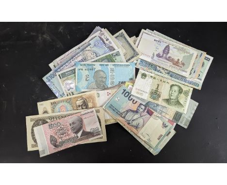 A Group of Assorted World Banknotes. To include Indonesia, India, Argentina, Vietnam, Barbardos, Jamacia, Turkey etc