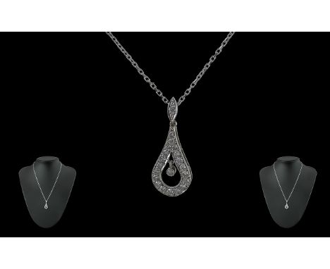Ladies - Excellent 18ct White Gold Diamond Set Pendant Attached to a 18ct White Gold Chain. The 24 Round Brilliant Cut Diamon