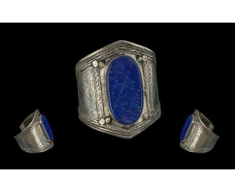 Large Lapis Cuff, 800 white metal.  Large oval Lapis set in wide white metal bangle decorated with engraving.