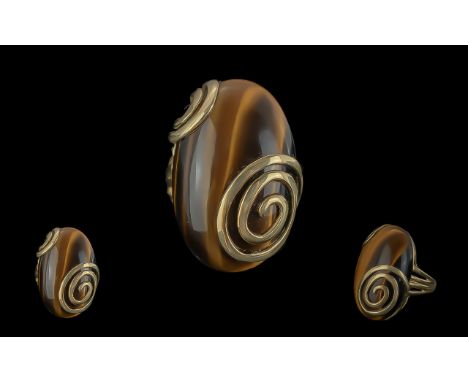 9ct Gold Pleasing Single Stone Tigers Eye Set Ring with Stylish Design / Setting, Marked 9ct to Shank. The Large Oval Shaped 