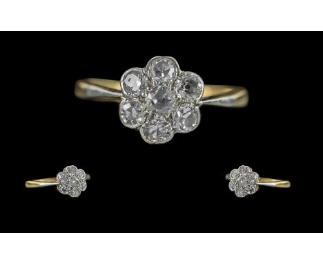 Edwardian Period Ladies 18ct Gold and Platinum Petite Diamond Set Cluster Ring, marked 18ct and platinum to shank, the seven 