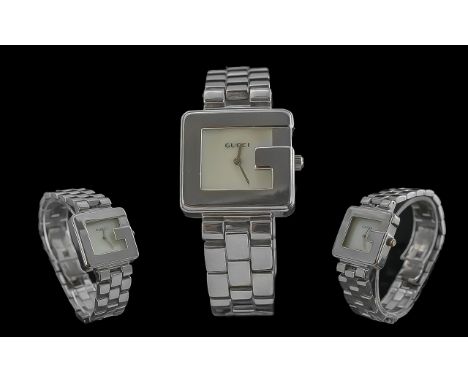 Gucci Ladies Stainless Steel Heavy Square Shaped Quartz Fashion Wrist Watch - Ref 0012128. Features Bezel In The Form Of A 'G