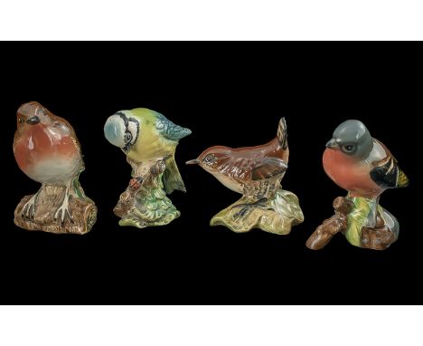 Four Beswick Birds, comprising Robin 980, Blue Tit 992, Wren 993, and Chaffinch 991.