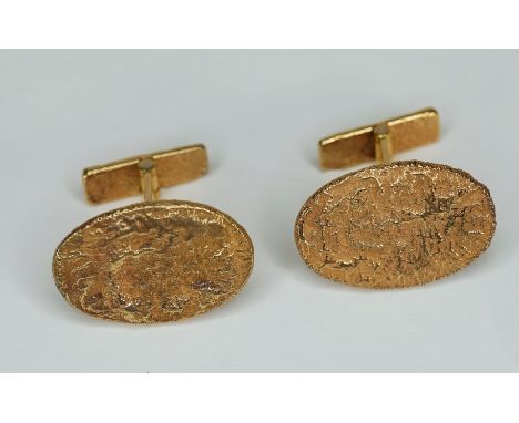 Paar massive Manschettenknöpfe 14 K Gold, gestempelt und mit Juweliermarke versehen. Ovale Knöpfe mit rau bearbeiteter Oberfl
