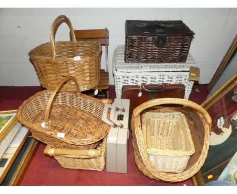 A collection of wicker baskets, two hampers, leather Gladstone bag, lady's briefcase etc 