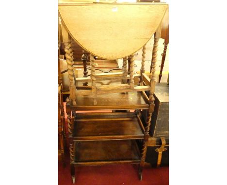 A faded oak barley twist turned gateleg occasional table, together with a further barley twist turned three-tier tea trolley 