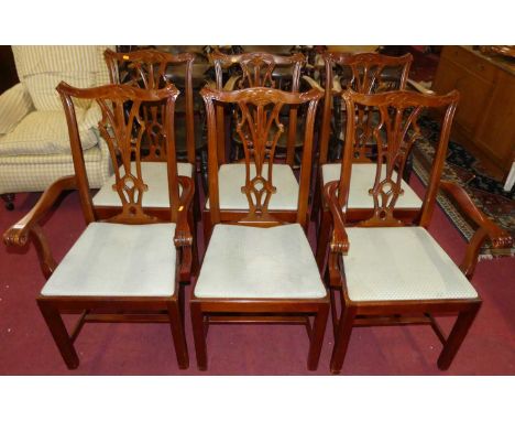 A set of six contemporary Chippendale style stained beech splatback dining chairs, having fabric upholstered drop-in pad seat