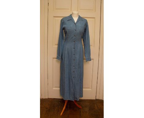 A blue denim maxi dress by Richard Sharps with high patch pockets, buttons down front size 10 late 1970's  possibly unworn. 