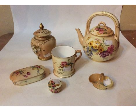 A Royal Worcester collection of assorted blush ivory ware including tea pot, pot pourri, 2 trinket boxes, basket and Tcup, et