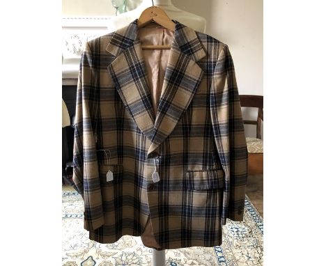 A collection of men's items to include; a 1970's safari suit, in pale blue, with patch pockets, size 42; a black/white check 