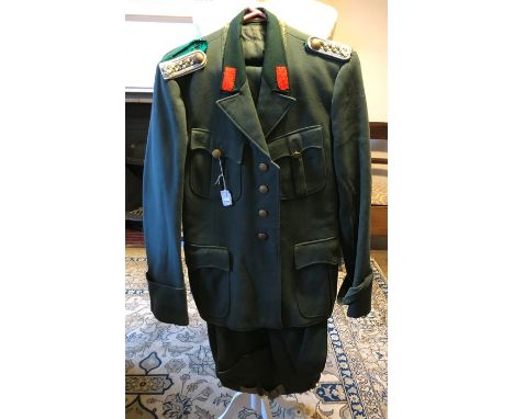 A collection of 1970s uniforms and a band masters uniform. An 1940/50s wool band master uniform in black with wide lapels and