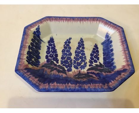 A 1930s Carlton ware bowl with decoration of blue delphiniums.