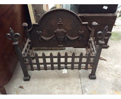 A 19th Century cast iron fire grate, urn and swag decorationff