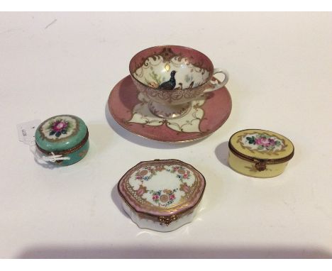 Three European hard paste lidded trinket boxes and a cabinet tea cup and saucer (4)