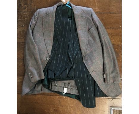 Gentlemans Bottle Green 3 piece suit along with a light grey Boss suit