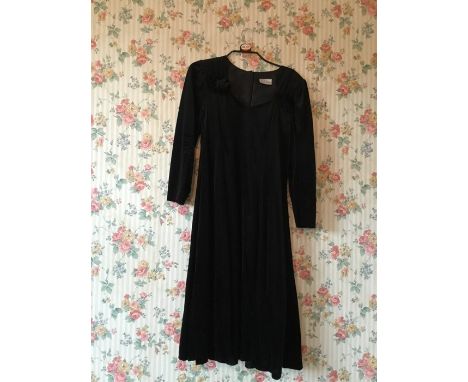 Black velvet evening dress, by Essence, sweet heart neckline and ankle length with long sleeves and rosettes; a black cotton 