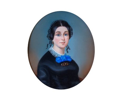 Pascal (French, 19th Century), portrait of a lady, bust length wearing a blue bow and a black dress, signed and dated 1852 l.