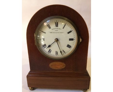 An early 20th century mantle clock, wooden case with Eureka Clock &amp; Co 1000 day electric clock movement and an early 20th