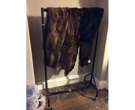 One early1950 stripped Musquash fur stole, one light brown Musquash, along with one black Musquash with fur tassles (3)