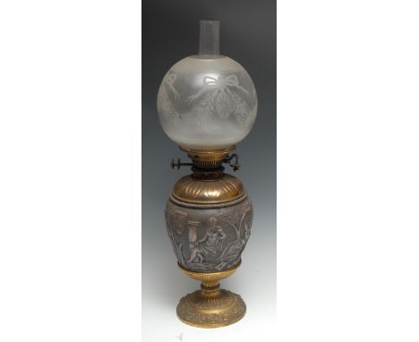 A 19th century silvered and gilt-metal ovoid table oil lamp, in the Grand Tour taste, chased after the Antique with figures a