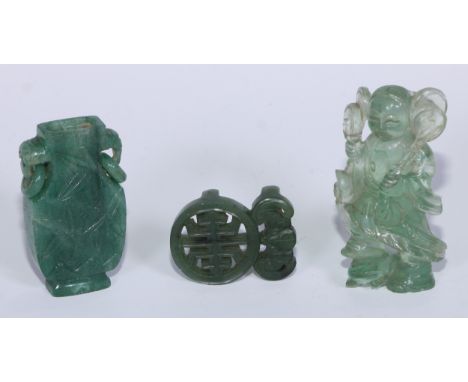 A Chinese flattened jade archaic vase, ring handles, 6cm high; a 'jade' quartz figure; a jade buckle (3) 