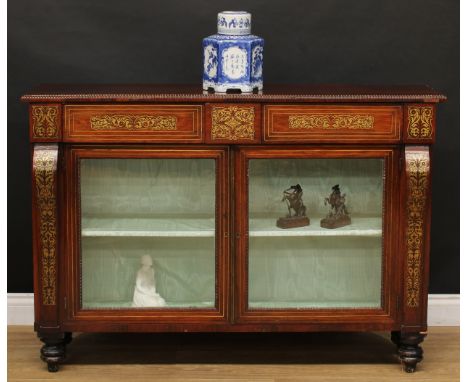 A Regency rosewood and brass marquetry side cabinet, rectangular top applied with egg-moulded edge above a pair of frieze dra