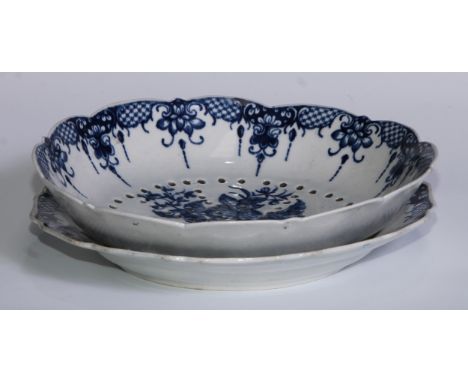 A  Worcester cress or  salad drainer and stand, printed in underglaze blue with peony between two pine cones and a pomegranat