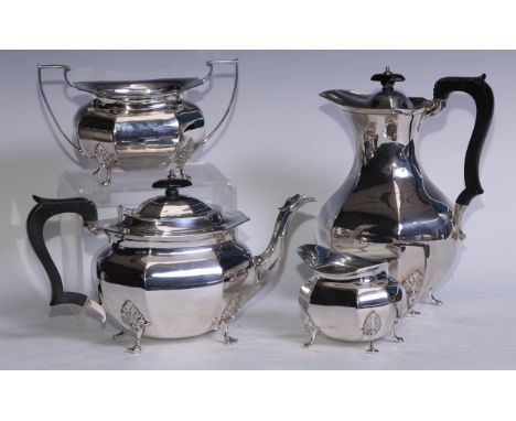 A silver four piece panelled boat shaped tea service, angular handles, leafy scroll feet, 24cm high, R F Mosley &amp; Co (Rob