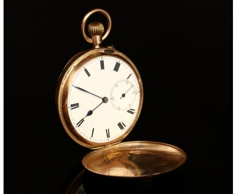 A 9ct gold hunter pocket watch, enamel dial, Roman numerals, subsidiary seconds dial, side wind. 