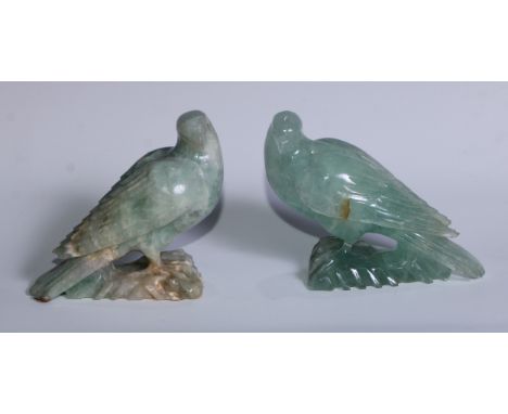 A pair of Chinese jade quartz models, of song birds, 13cm high 