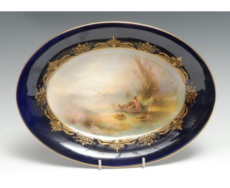 A Royal Worcester oval dish, painted by James Stinton, signed, decorated with duck and ducklings, cobalt blue border, applied