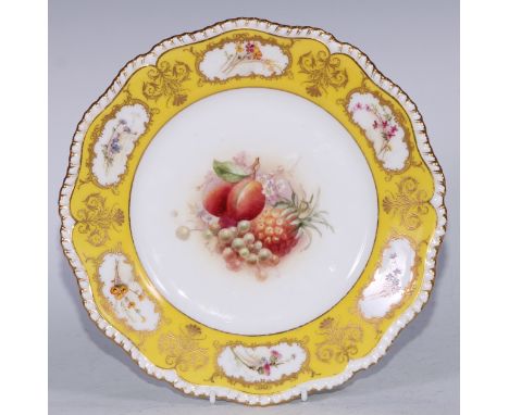 A Royal Worcester circular plate,  painted by Ricketts, signed, with fruit, the yellow rim with six  oval panels painted with
