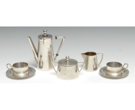 A small Austrian silver tête-à-tête, comprising coffee pot, cream jug, sucrier, and a pair of cans and saucers, the coffee po