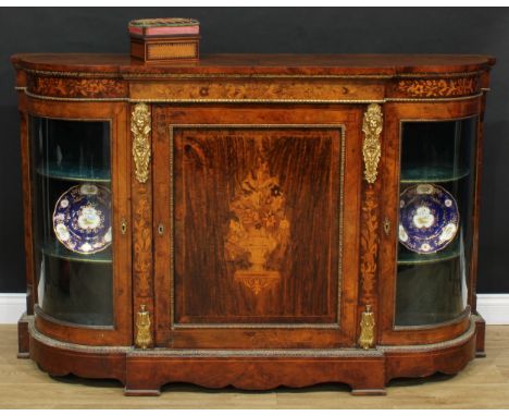 A Victorian gilt metal mounted walnut, simulated walnut and marquetry credenza, slightly oversailing top above a central pane