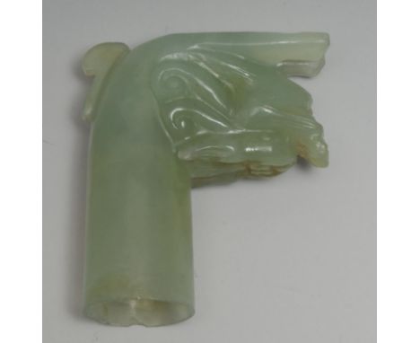 A Chinese jade libation cup, carved as a dragon, 7cm high 