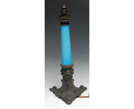 A late 19th century French monochrome earthenware and patinated oil lamp, now converted for electricity, 53cm long, c. 1900 