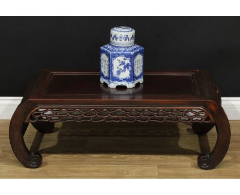 A Chinese hardwood low opium table, rectangular panel top above a frieze pierced and carved with clouds, scroll feet, 32.5cm 