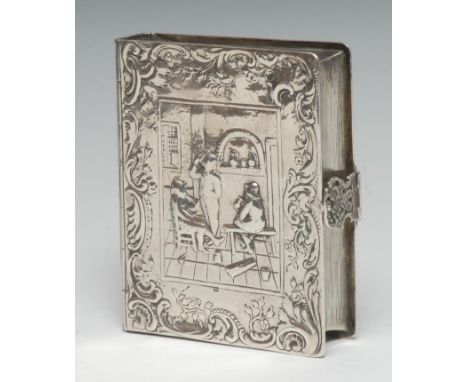 A 19th century Continental novelty table snuff or tobacco box, in the form of a book, chased in the Teniers manner with figur