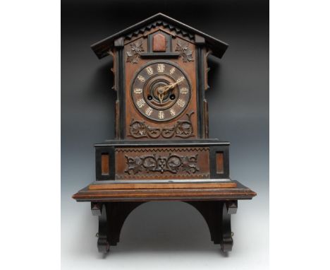 A Black Forest cuckoo clock, 16cm chapter ring with carved bone Roman numerals, twin-winding holes, 8-day movement striking o