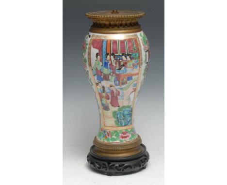 A Chinese famille rose baluster vase, ormolu mounted as a lamp, painted with ladies of the court, within panels on a ground o