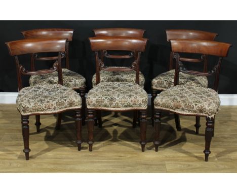 A set of six Post-Regency mahogany bar-back dining chairs, each with a curved cresting rail, the mid-rail carved with scrolli