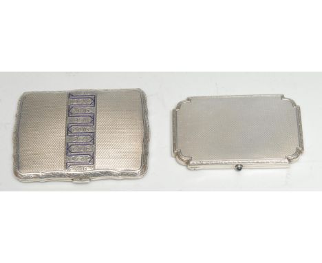 A Continental silver shaped rectangular cigarette case, engine turned and engraved with bands of scrolling foliage, the hinge