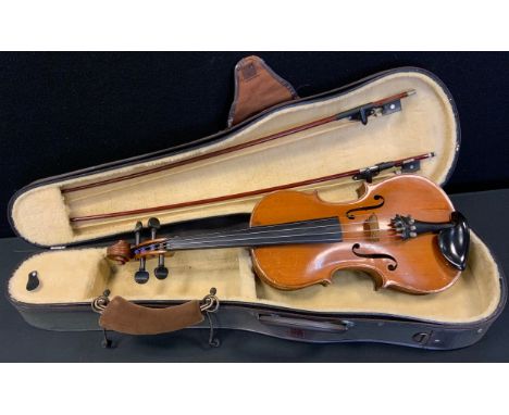 A 19th century violin, the two-piece back 35.5cm long excluding button, outlined with purfling, label for Funkenstein Musial 