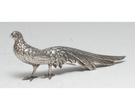 A Continental silver table decoration, a model of a pheasant, 15.5cm long, naturalistically embossed, indistinctly marked 