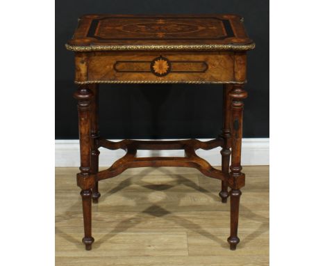 A gilt metal mounted walnut and marquetry work table, hinged hipped rectangular top inlaid with a trophy of love and love los