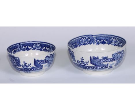 A  Worcester Bat pattern bowl,  printed in blue with a chinoiserie garden, 14cm diam, crescent mark;  another, smaller, 11cm 