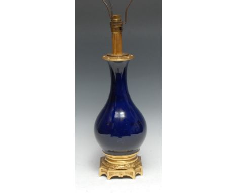 An ormolu mounted porcelain lamp base, in cobalt blue, 44cm high 