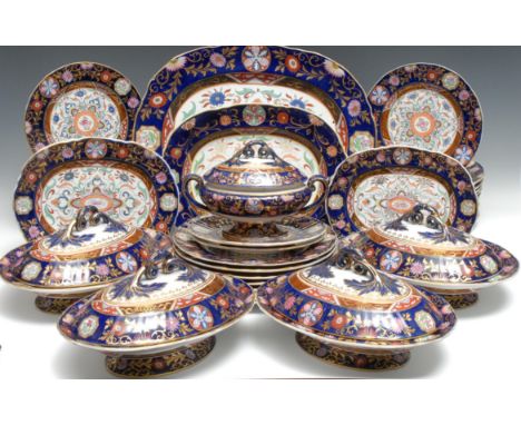 An extensive Ashworth Real Ironstone dinner service, comprising seven large plates, twenty-four smaller plates, four tureens 