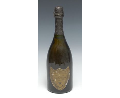 Champagne Cuvée Dom Pérignon Vintage 1980, [750ml], label scuffed but respectable, level just below the base of the neck, sea